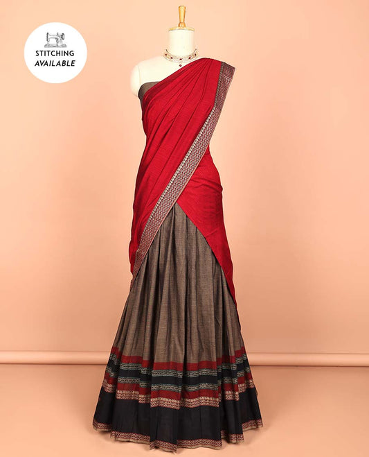 Brown cotton half saree with contrast striped zari border, plain blouse & plain with striped zari border dhavani
