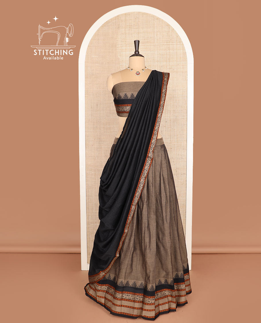 Brown cotton half-saree, plain with contrast traditional motifs woven bordered skirt, matching blouse, and a contrast bordered dhavani