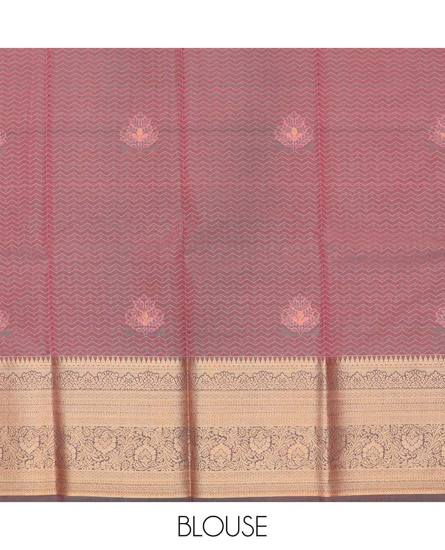 Peach art silk pavadai material, embossed with zari buttas woven skirt, contrast traditional zari border, and blouse