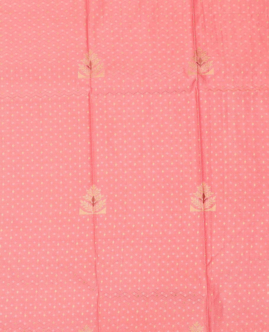 Peach art silk pavadai material, embossed with zari buttas woven skirt, contrast traditional zari border, and blouse