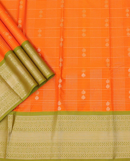 Orange Art Silk Pavadai Material Set Featuring Zari Butta Enclosed Checked Skirt, Complemented by a Contrast Traditional Zari Motifs Woven Border, and Paired with a Contrast Blouse