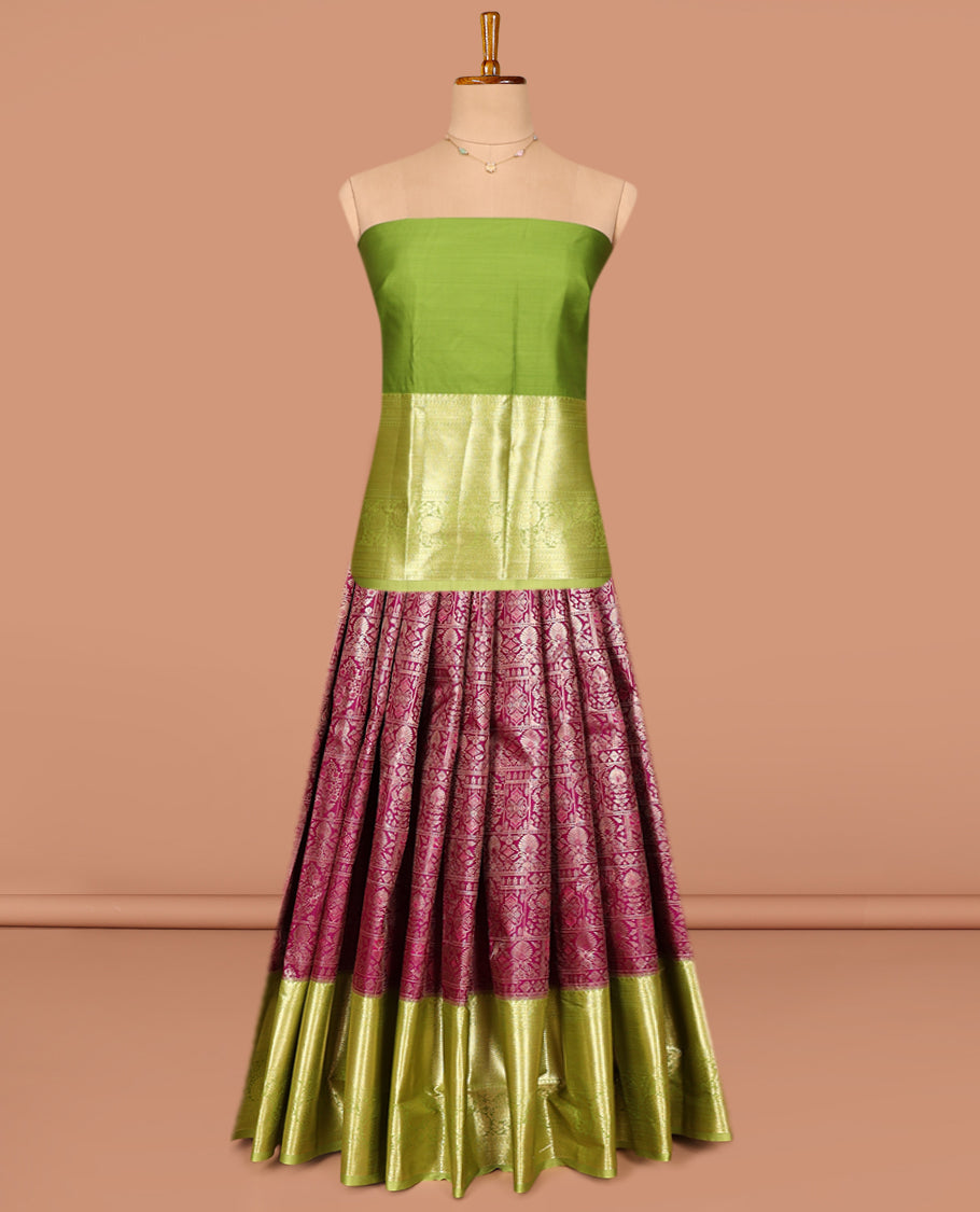 Burgundy Art Silk Pavadai Material Set, Elegantly Highlighted with Jacquard on Its Skirt, Complemented by a Contrast Traditional Zari Designs Border, and Paired with a Contrast Blouse
