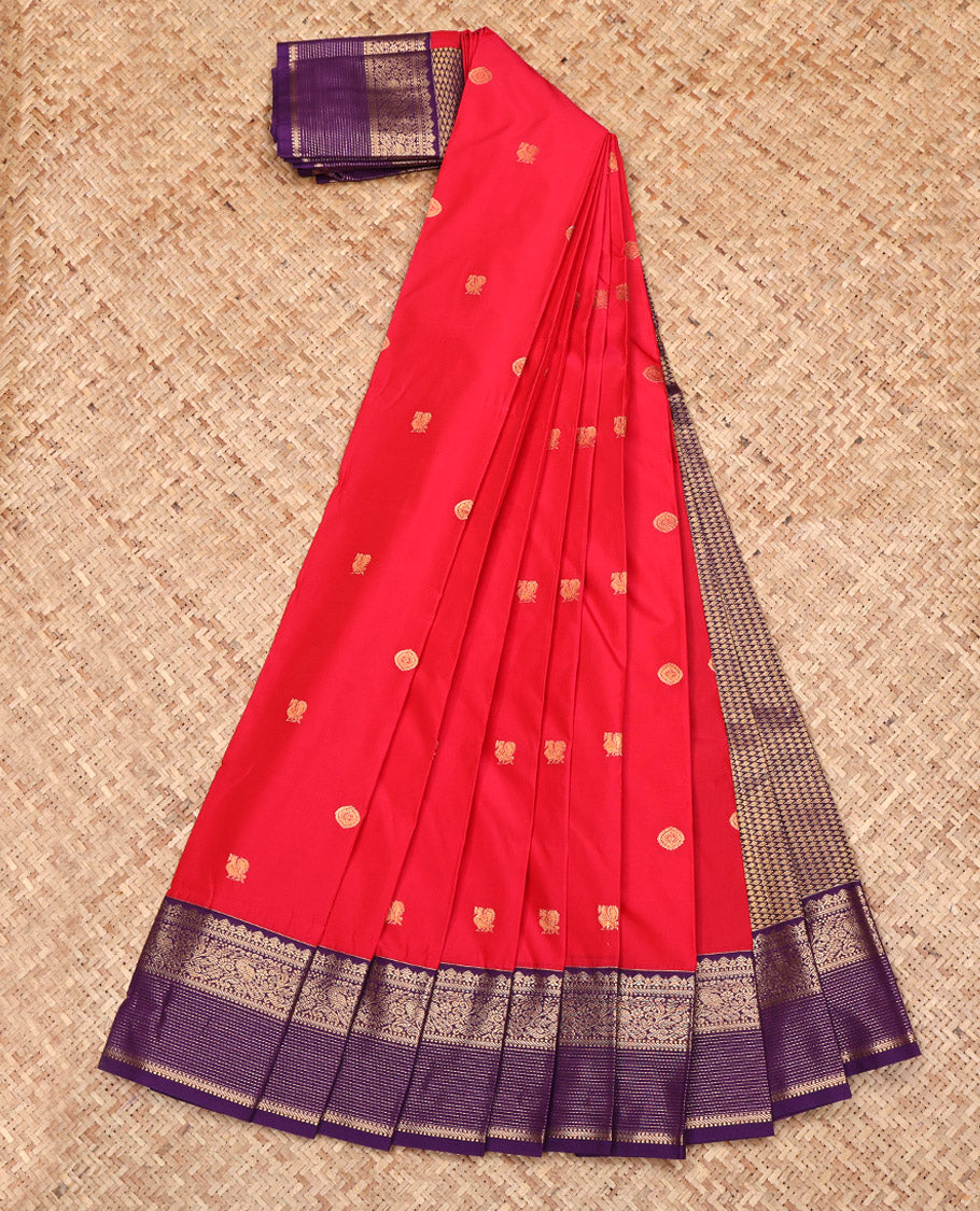 Red Budget Silk Saree, Highlighted by Peacock-Chakram Buttas All Over Its Body, Complemented by Contrast Traditional Zari Design Border, Grand Jaal Pallu, and Paired with a Contrast Blouse