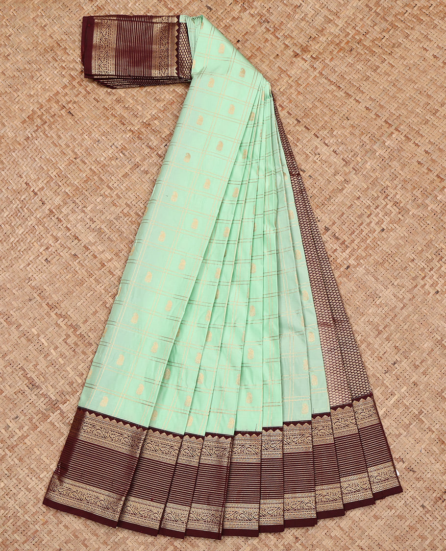 Pista Green Budget Silk Saree, Adorned with Butta Enclosed Checks, Complemented by a Contrast Traditional Zari Border, Grand Pallu, and a Contrast Blouse