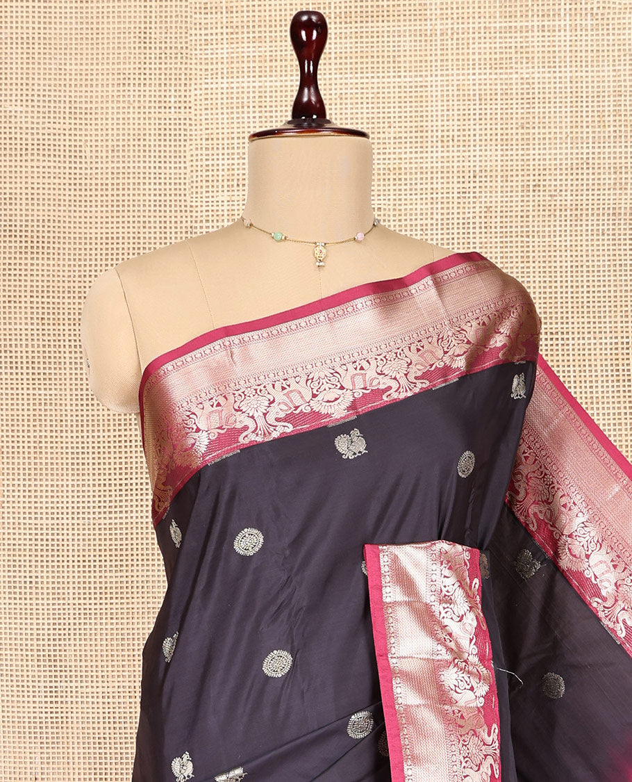 Black Budget Silk Saree, Adorned with Peacock-Chakram Buttas, Complemented by a Contrast Traditional Border, Pallu of Jaal and Paisleys, and a Contrast Blouse