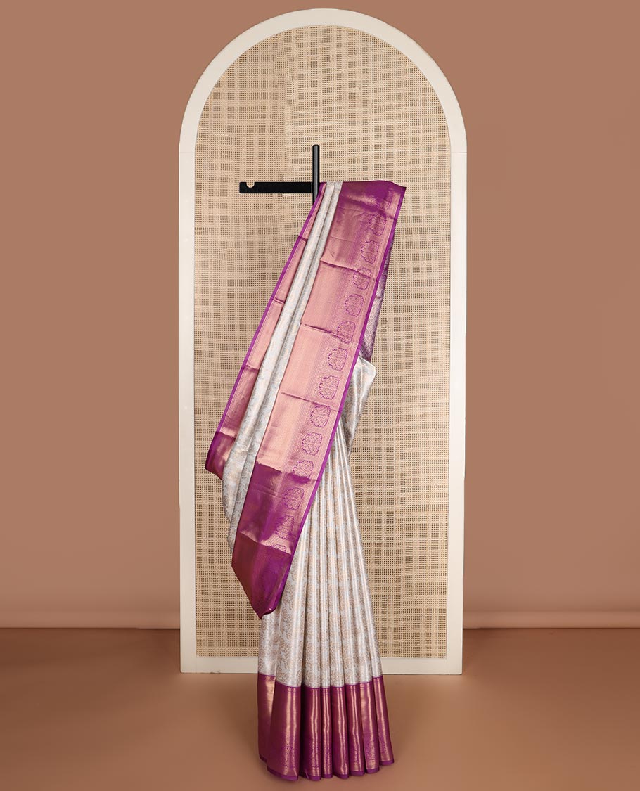Cream zari floral jacquard budget silk saree, contrast traditional zari border, and ogee patterned pallu