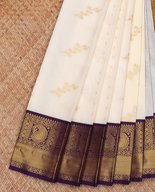 Cream zari buttas gift saree, contrast traditional zari border of paisleys, and pallu of big paisleys