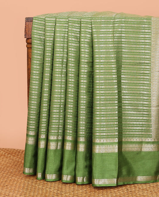 Parrot green zig-zag stripes with polka dots zari woven assam silk saree, traditional motifs woven double border, and zari design pallu
