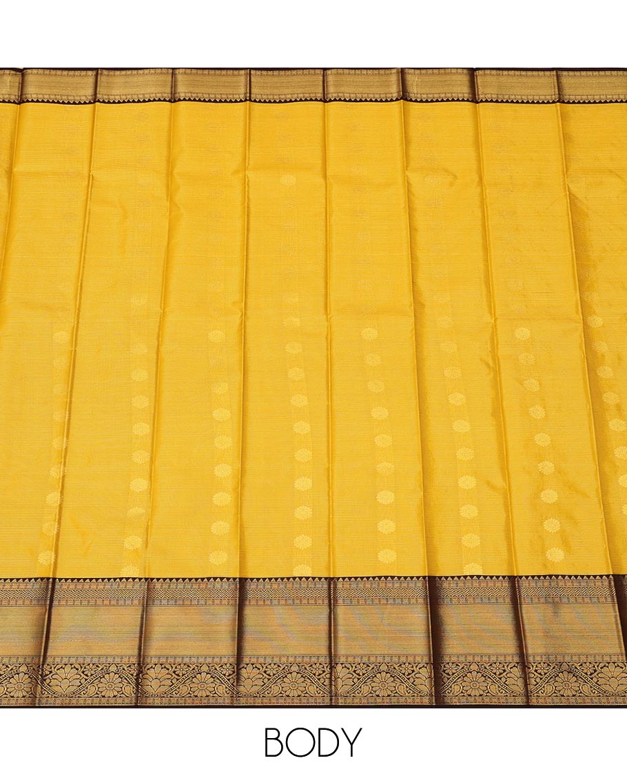 Yellow zari buttas, and striped gift saree, contrast traditional zari design border, and geometric patterned pallu