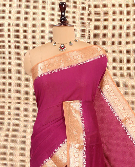 Magenta Plain Assam Silk Saree, Complemented by Contrast Zari Border of Floral Creeper Designs, Pallu Depicts Zari Stripes, and Paired with a Contrast Blouse