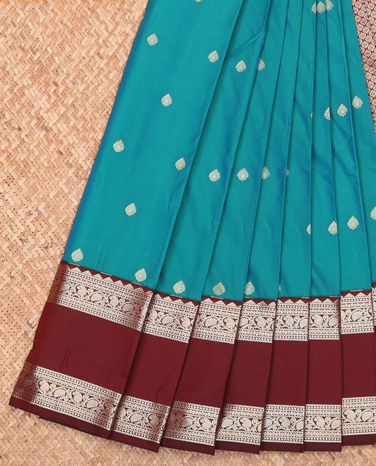 Blue Budget Silk Saree, Beautifully Bedecked with Zari Buttas and Micro-Checks on Its Body, Complemented by a Contrast Traditional Zari Design Rettai Pettu Border, Jaal Design Pallu, and Paired with a Contrast Blouse