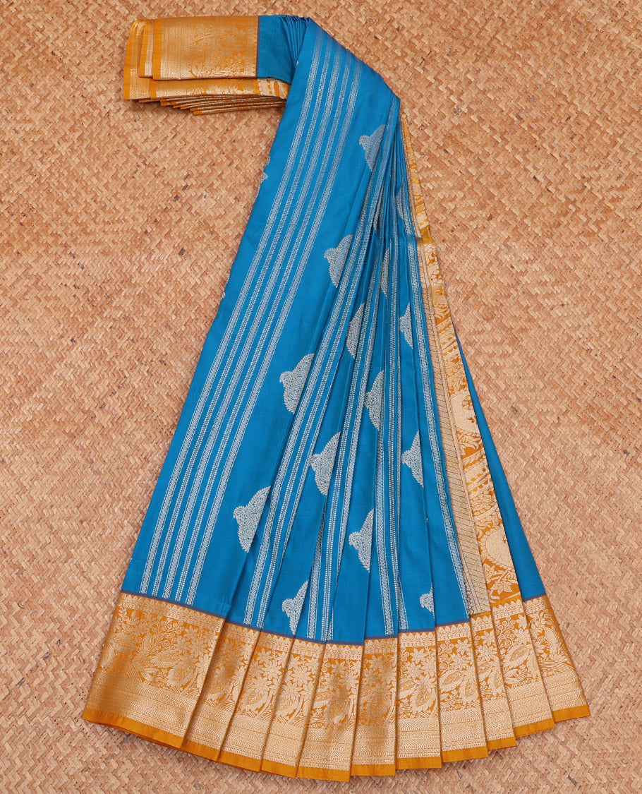 Azure Blue Budget Silk Saree Enriched with Paisley Buttas and Stripes All Over Its Body, Complemented by a Contrast Traditional Border of Floral Designs, Gracefully Embellished Pallu of Paisleys, and Paired with a Contrast Blouse