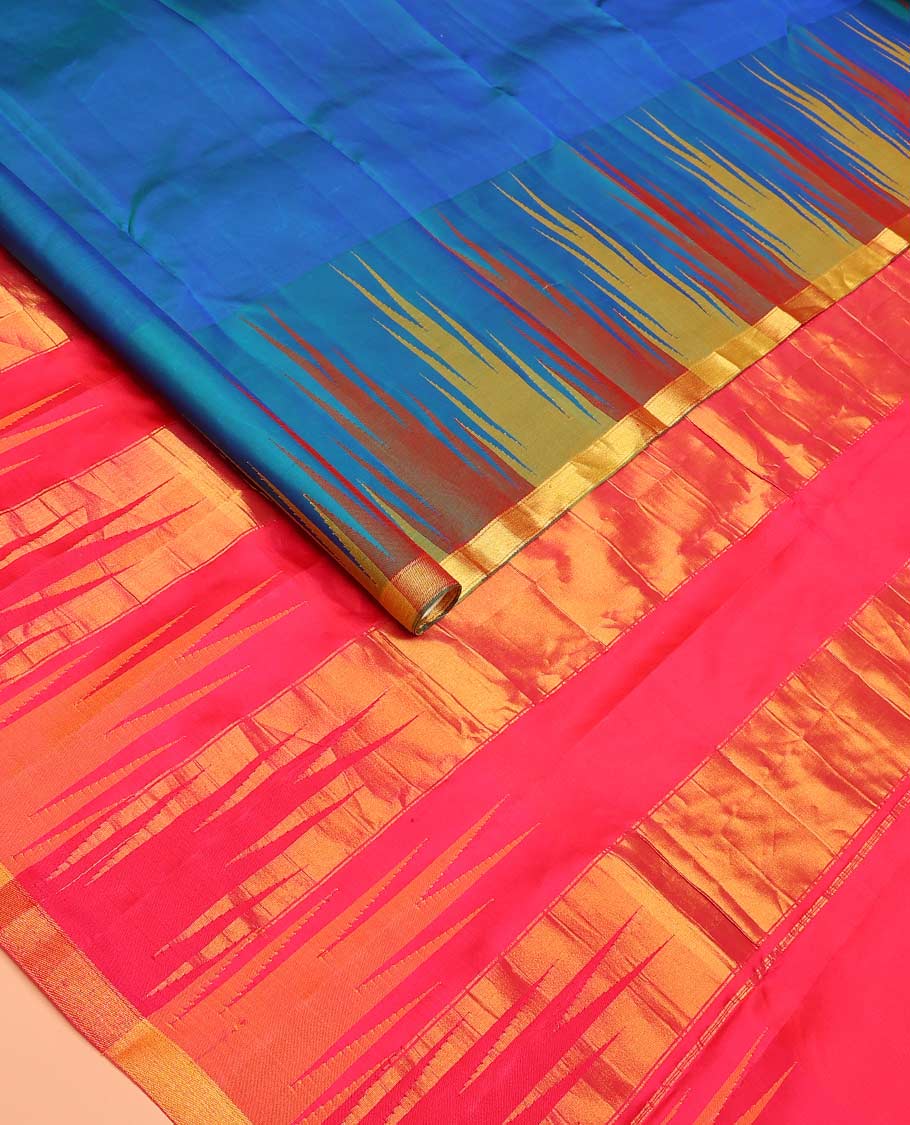 Blue plain Bangalore silk saree, contrast temple piping border, and zari-rich pallu of temple designs
