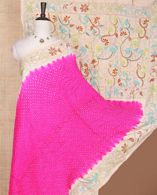 Rani pink bandhani dotted bandhani silk saree, contrast floral vine kantha embroidered border and colorful floral vine kantha embroidered pallu