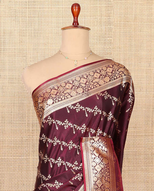 Wine Semi-Banaras Saree, Artfully Detailed with Floral Jaal Jacquard All Over Its Body, Highlighted by a Traditional Motif Border, Intricately Designed Pallu, and Paired with a Matching Blouse