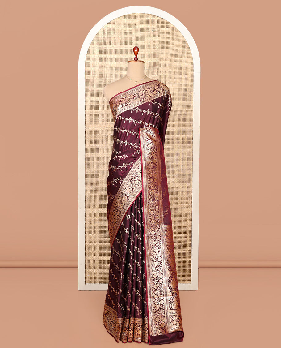 Wine Semi-Banaras Saree, Artfully Detailed with Floral Jaal Jacquard All Over Its Body, Highlighted by a Traditional Motif Border, Intricately Designed Pallu, and Paired with a Matching Blouse