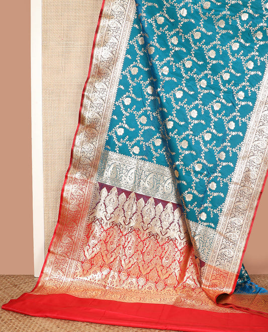 Blue floral jaal jacquard banarasi silk saree, contrast paisleys design border, and paisley patterned pallu