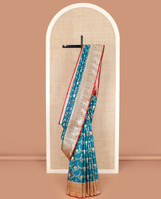 Blue floral jaal jacquard banarasi silk saree, contrast paisleys design border, and paisley patterned pallu