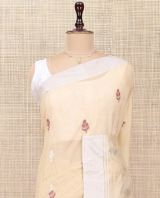 Sandal Chanderi Cotton Saree, Woven with Floral Buttas All Over Its Body, Highlighted by a Bavanji Border, Pallu Steeped with Zari Stripes, and Paired with a Matching Blouse