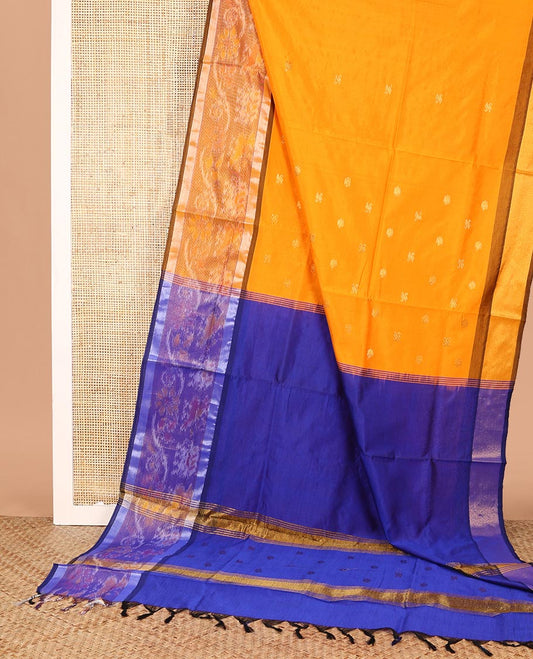 Orange Poly Cotton Saree, Sparsely Woven with Buttas All Over Its Body, Complemented by a Contrast Ikkat Border, Captivating Contrast Ikkat Pallu, and Paired with a Contrast Blouse