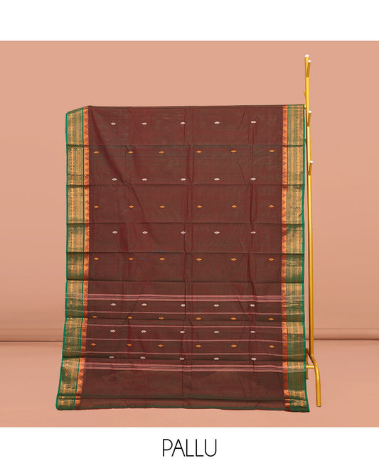 Red Chettinad Cotton Saree, Finely Woven Buttas All Over Its Body, Complemented by Contrast Traditional Zari Design Border, Pallu of Stripes, and Paired with a Matching Blouse