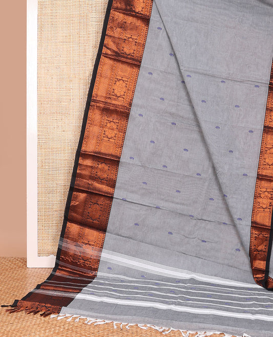 Grey paisley buttas Chettinad cotton saree, contrast traditional zari design border, and striped pallu