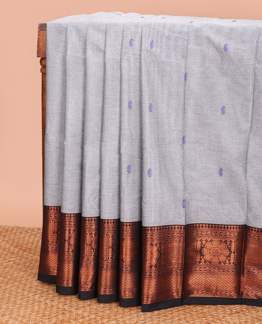 Grey paisley buttas Chettinad cotton saree, contrast traditional zari design border, and striped pallu