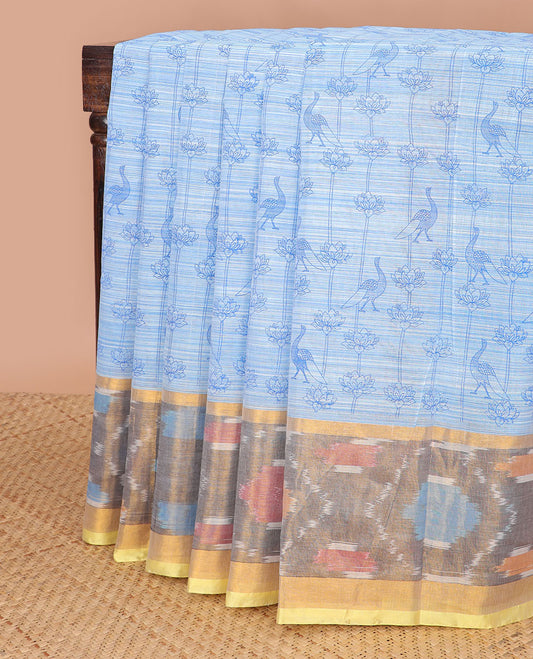 Sky blue floral, bird motifs chirala cotton saree with contrast floral design border & striped pallu