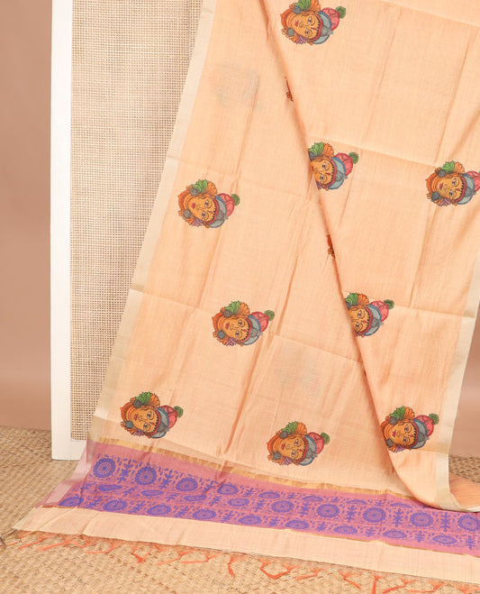 Pale orange kalamkari buttas printed chirala cotton saree, bavanji border, and contrast chakram motifs print pallu