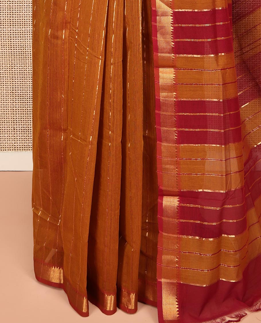 Mustard Mangalgiri Cotton Saree, Gleamed Up with Stripes on Its Body, Complemented by Contrast Zari Temple Border, Zari-Striped Pallu, and Paired with a Matching Blouse