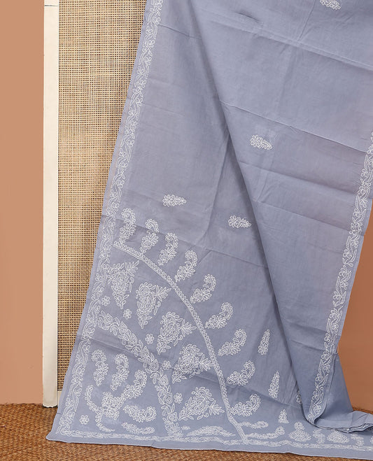 Grey floral thread embroidered buttas Lucknowi chikankari saree, floral creeper thread embroidered border, and paisley embroidered pallu