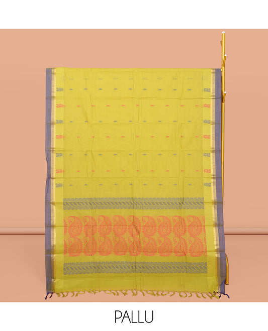 Green Kanchi Cotton Saree, Bedecked with Buttas All Over Its Body, Complemented by a Contrast Border, Pallu of Paisley Design, and Paired with a Matching Blouse