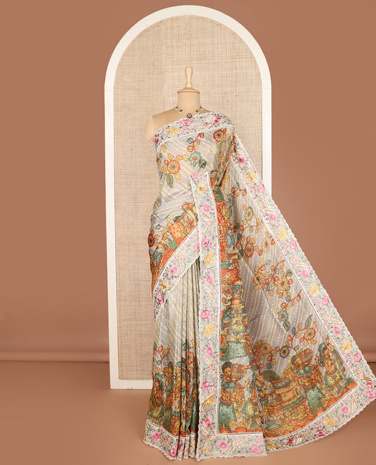 Grey buttas with bandhani and kalamkari floral-human motifs printed dola silk saree, contrast floral embroidered scallop border