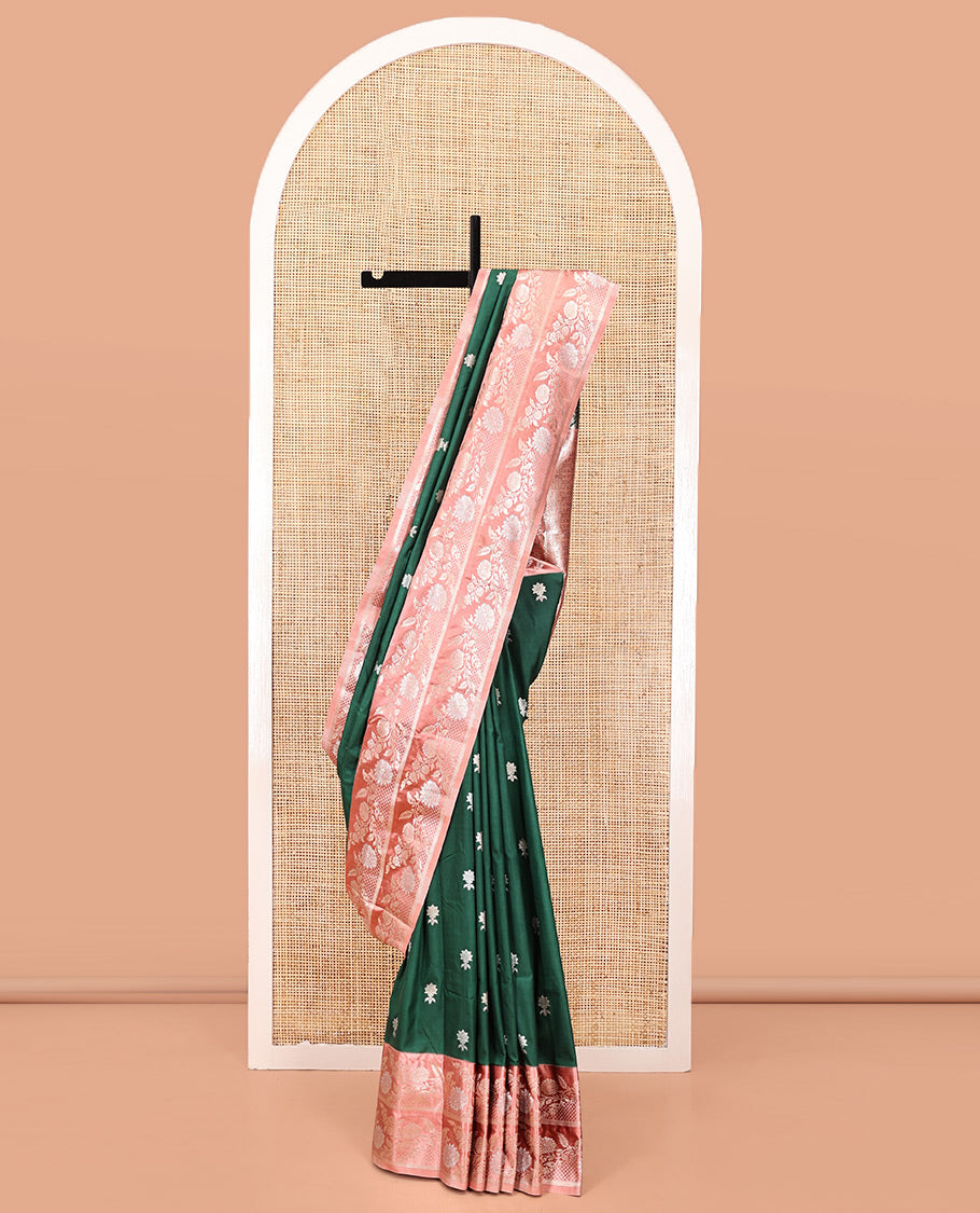 Bottle Green Mushuru Silk Saree, Enriched with Zari Buttas All Over Its Body, Complemented by Captivating Contrast Border of Floral Jaal Designs, Grandly Decked Up Pallu and Paired with a Contrast Blouse
