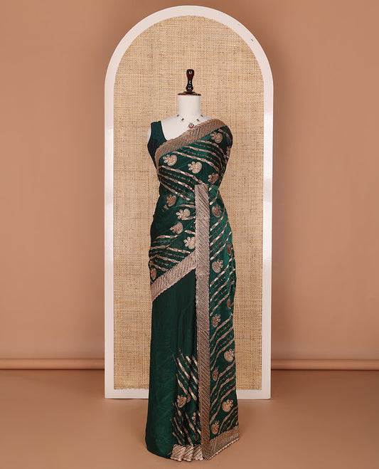 Deep forest green stone patch embroidered designer saree, self-scallop stone embroidered border