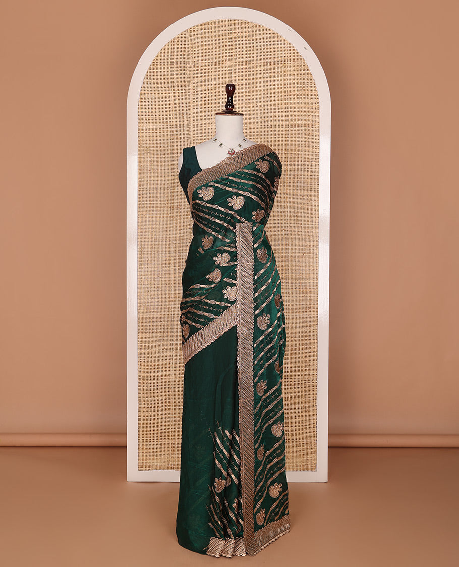 Deep forest green stone patch embroidered designer saree, self-scallop stone embroidered border