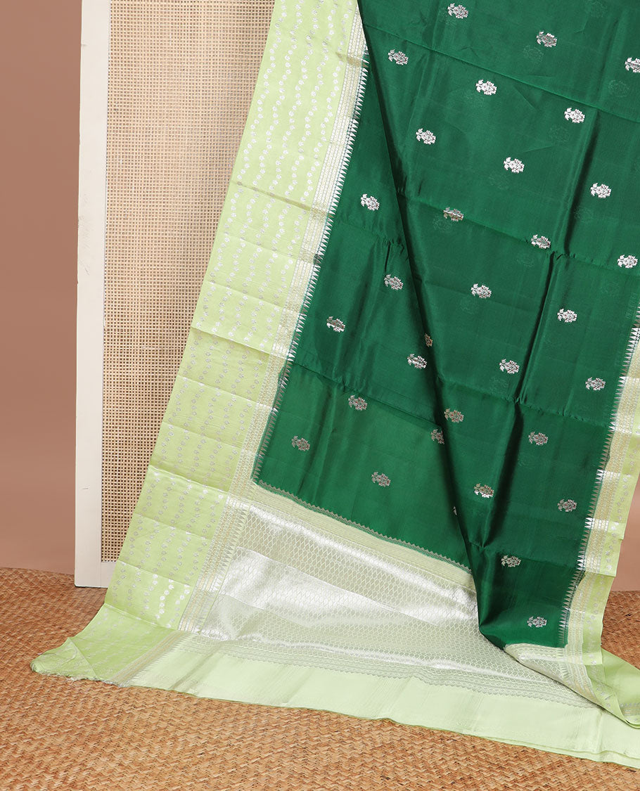 Green floral motifs raw mango silk saree with self zari design & floral design pallu