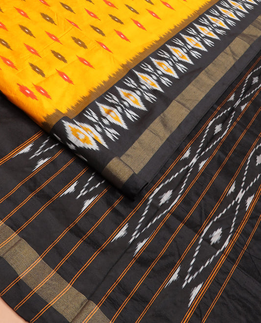 Yellow Ikkat Silk Saree Brightened with Ikkat Buttas, Complemented by a Contrast Ikkat Design Border, a Hazily Woven Pallu of Diamond Patterns, and a Contrast Blouse