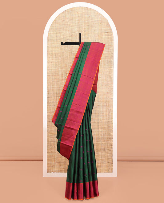 Green Kanchipuram Silk Saree, Accentuated with Thread Buttas All Over Its Body, Complemented by Contrast Border of Iruthalai Pakshi,  and Mayil Kann Designs, Jaal Pallu, and Paired with a Contrast Blouse
