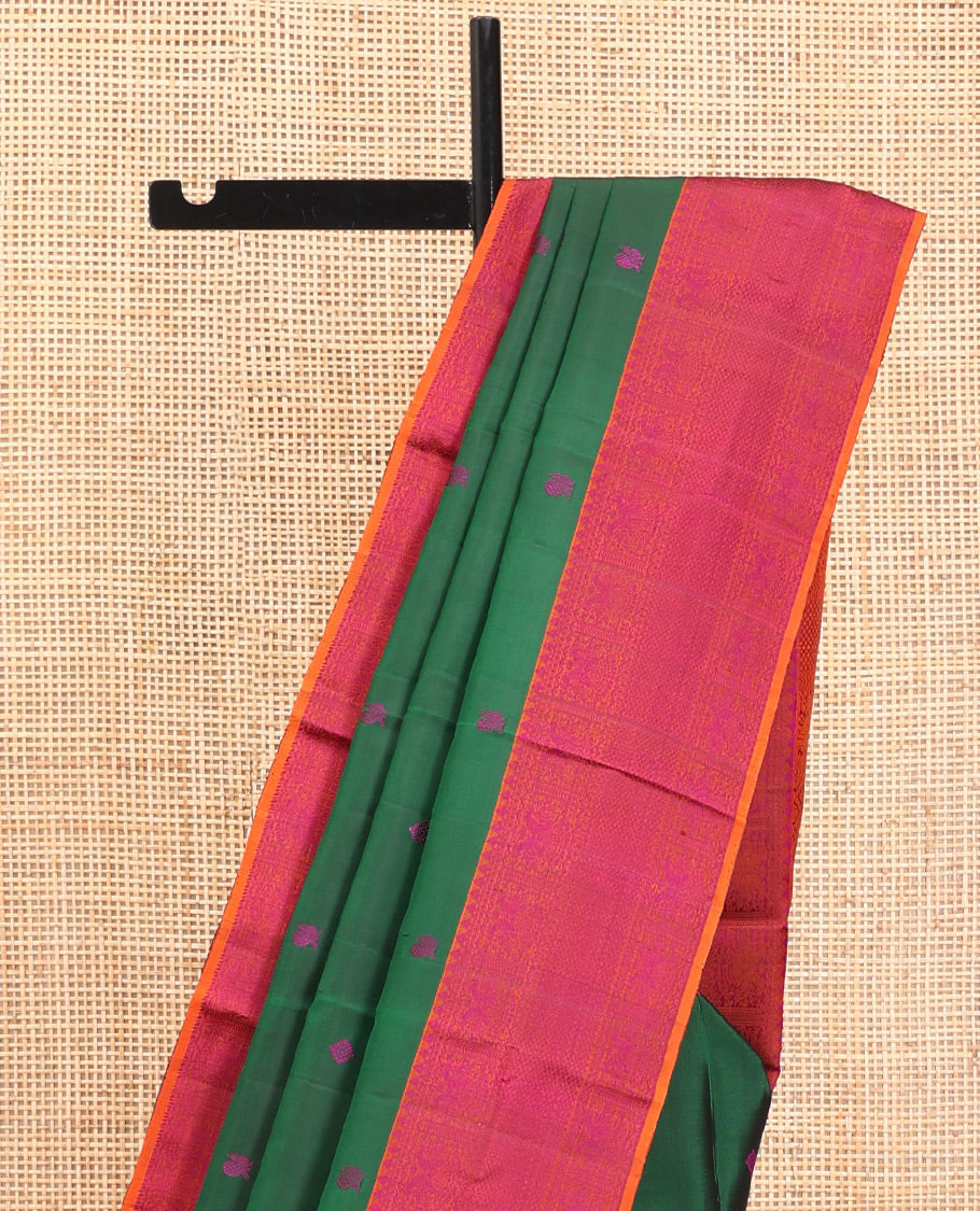 Green Kanchipuram Silk Saree, Accentuated with Thread Buttas All Over Its Body, Complemented by Contrast Border of Iruthalai Pakshi,  and Mayil Kann Designs, Jaal Pallu, and Paired with a Contrast Blouse