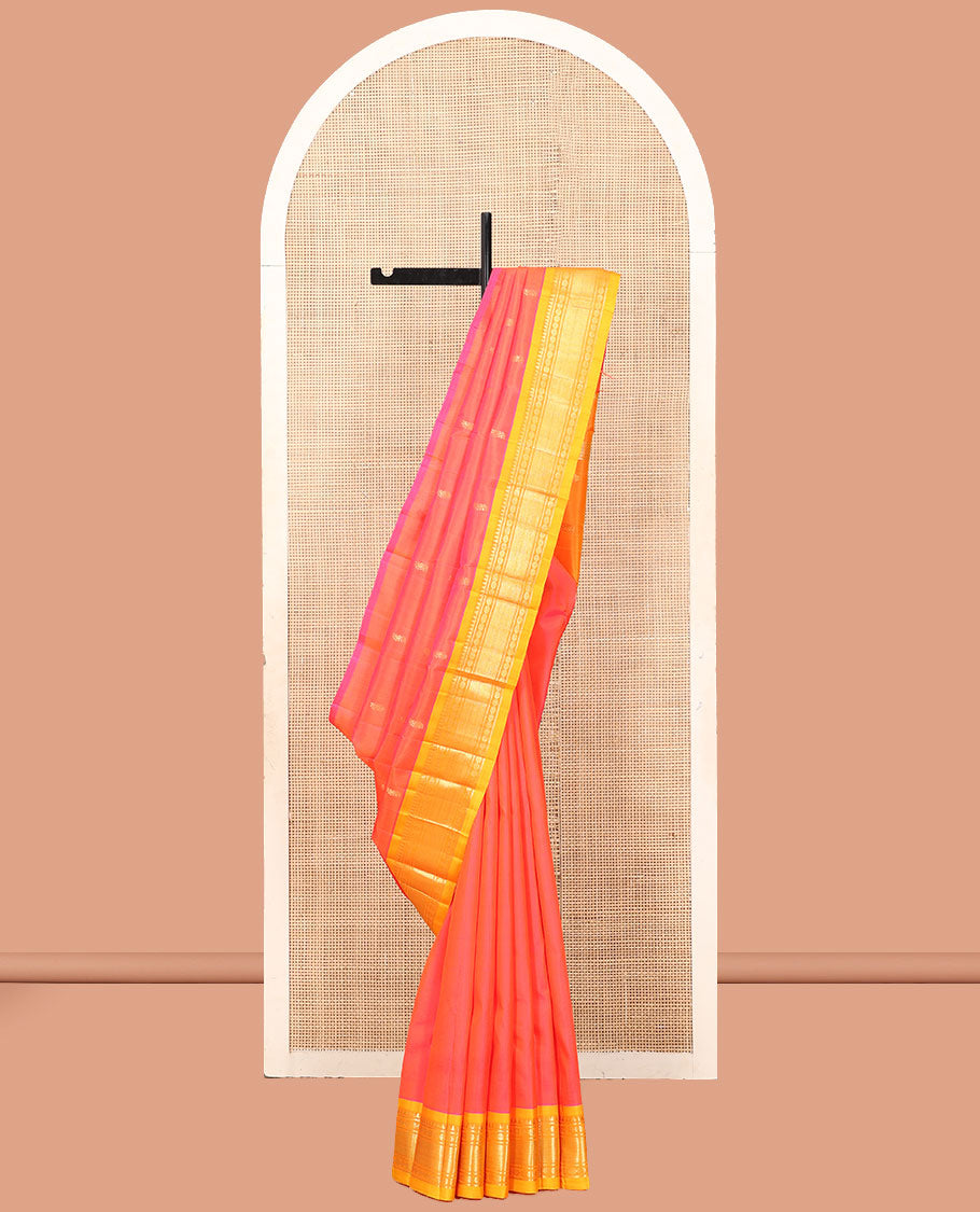 Pink Kanchipuram Silk Saree, Prettified with Zari Buttas, a Contrast One-Sided Border of Rekku, Banaras, Vanki, and Rudraksham Designs, a Zari Design Pallu, and No Blouse