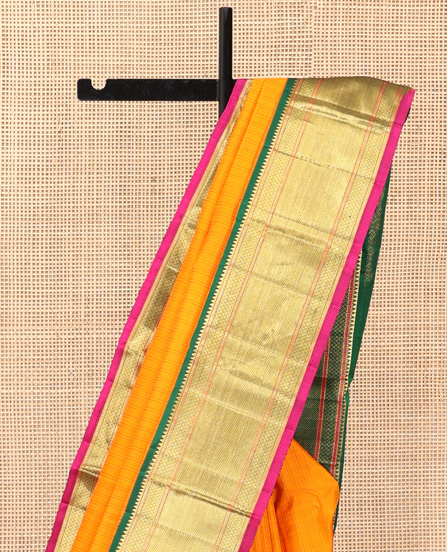 Orange Checked Kanchipuram Silk Saree, Complemented by a Contrast Korvai Border of Rekku, Muthu, Mayil Kann, and Zari Stripes, Grand Jaal Pallu, and a Contrast Blouse