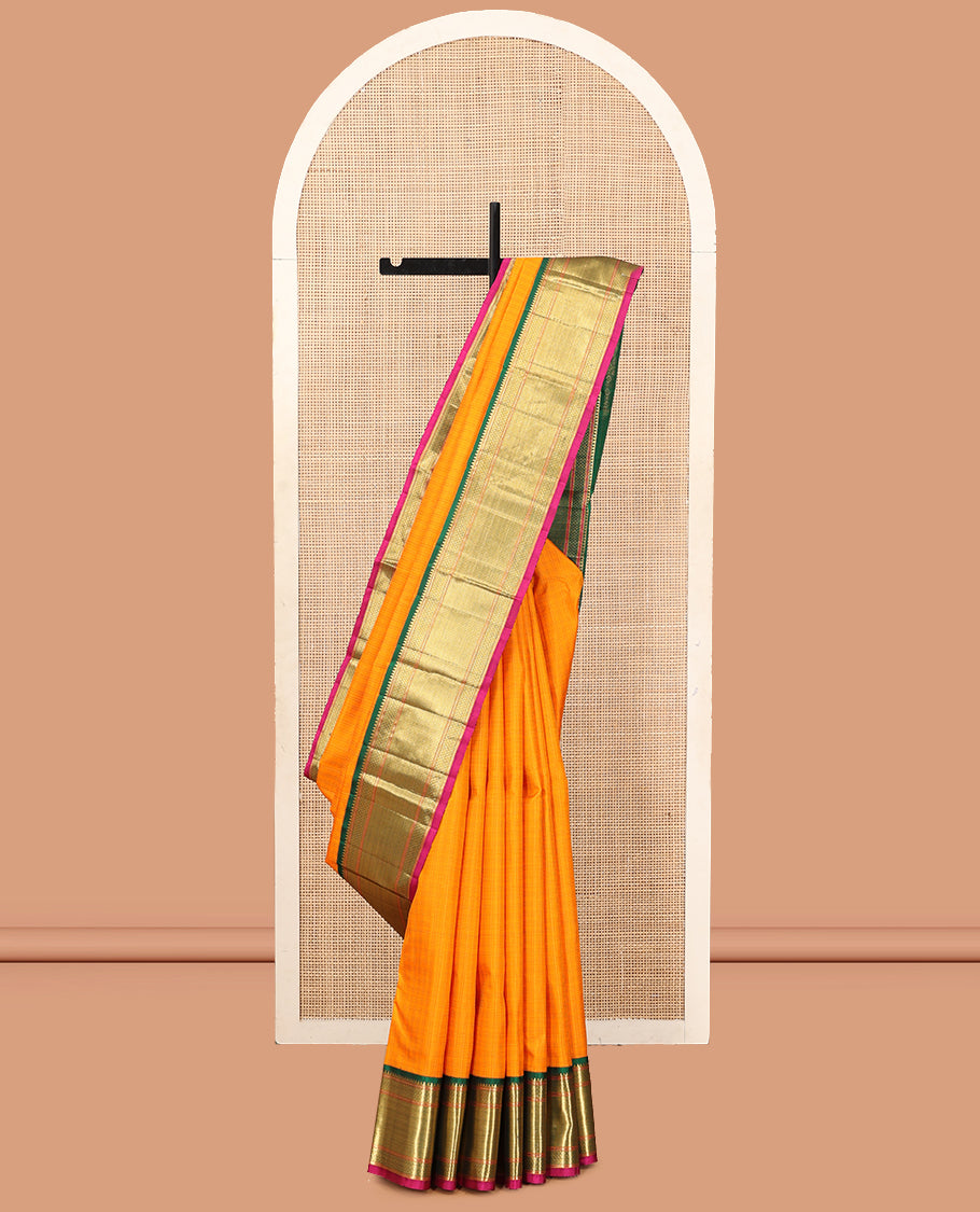 Orange Checked Kanchipuram Silk Saree, Complemented by a Contrast Korvai Border of Rekku, Muthu, Mayil Kann, and Zari Stripes, Grand Jaal Pallu, and a Contrast Blouse