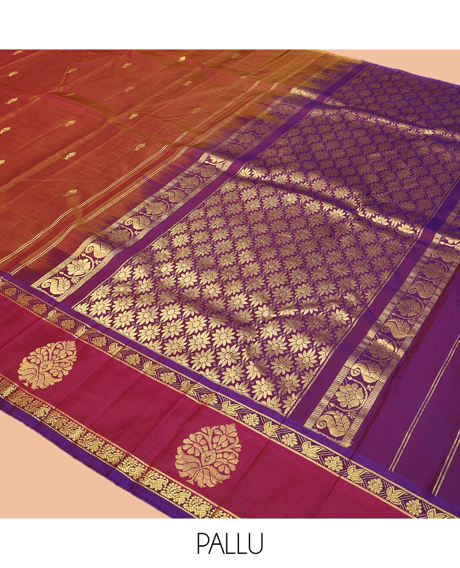 Brown Kanchipuram Silk Saree, Ornamented with Zari Buttas on Its Body, Complemented by a Contrast One-Sided Border of Floral and Peacock Designs, Pallu of Floral Zari Designs, and Comes Without a Blouse