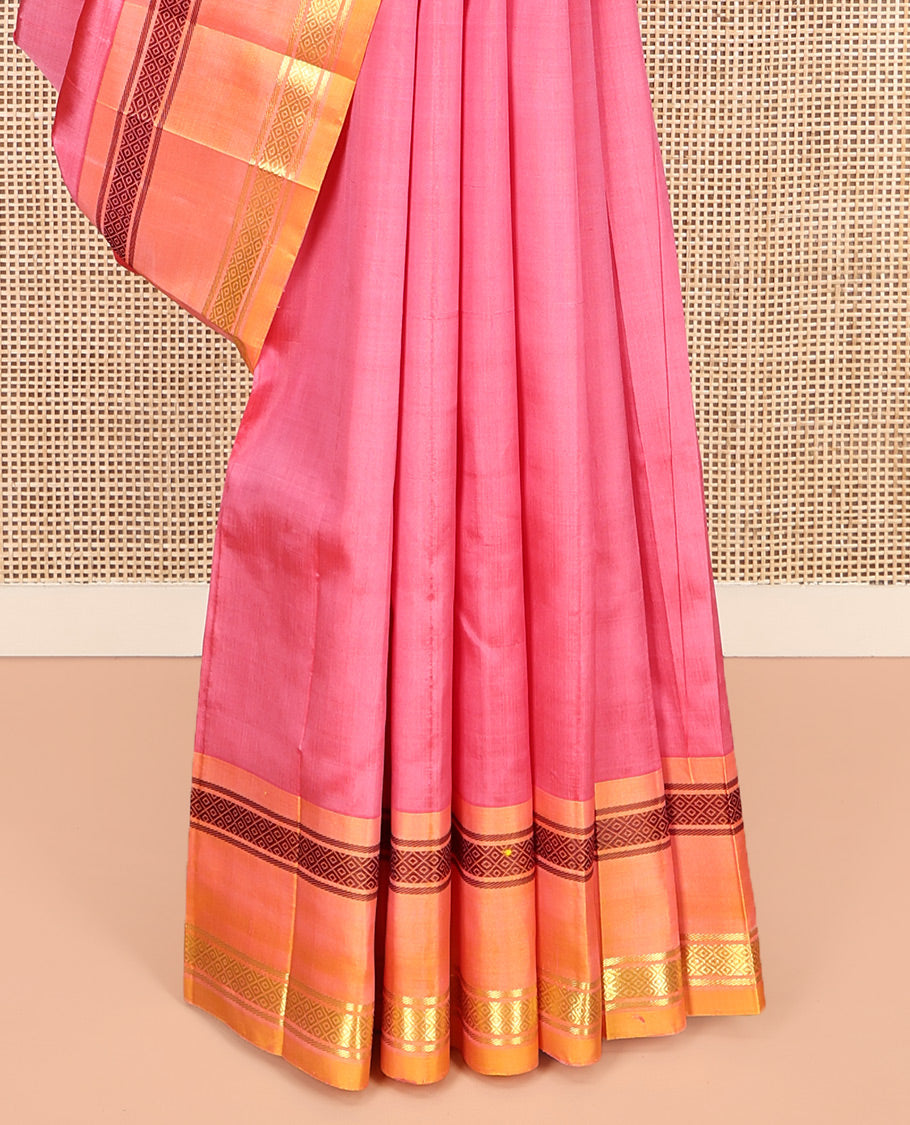 Pink Plain Kanchipuram Silk Saree, Complemented by a Contrast One-Sided Rettai Pettu Mayil Kann Border, Zari Striped Pallu, and No Blouse