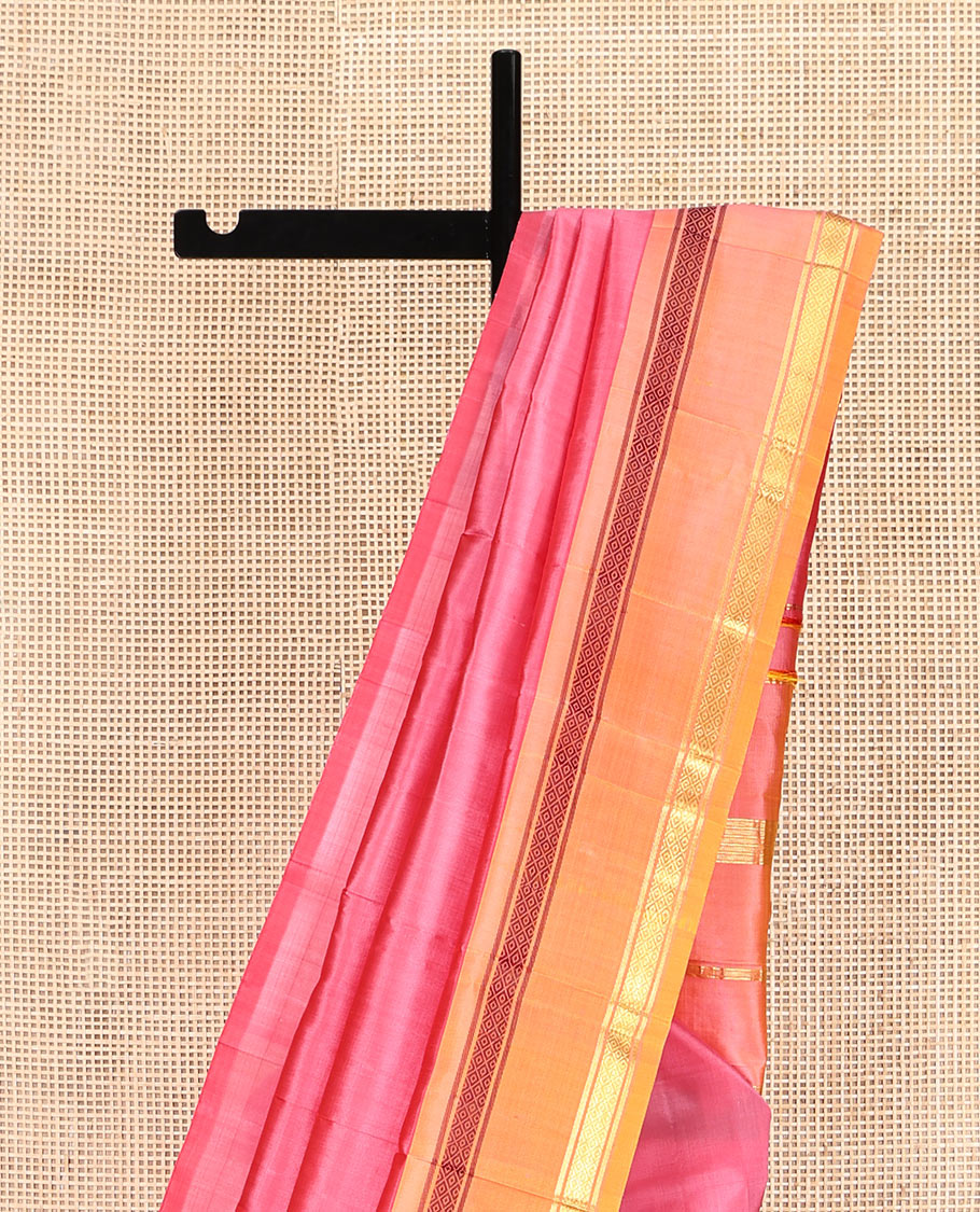 Pink Plain Kanchipuram Silk Saree, Complemented by a Contrast One-Sided Rettai Pettu Mayil Kann Border, Zari Striped Pallu, and No Blouse