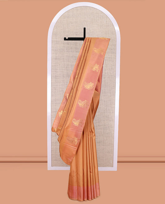 Orange Kanchipuram Silk Saree, Woven with Zari Buttas, Complemented by Semi Contrast Manga Motif Border, Pallu of Zari Design, and a Contrast Blouse