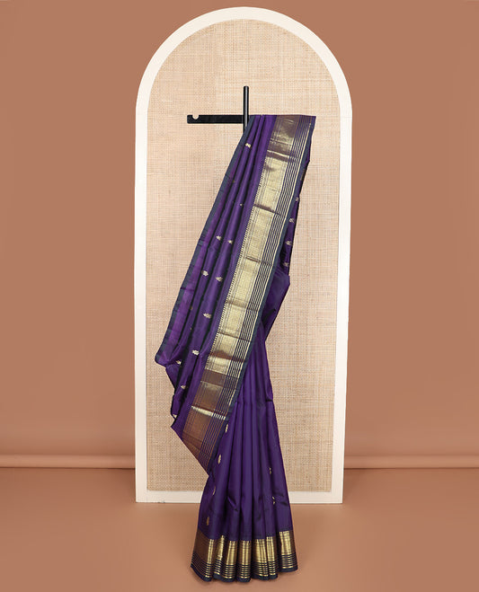 Blue zari buttas Kanchipuram silk saree, one-sided border of paneer sombu, banaras, muthu, and jaal design, and zari design pallu