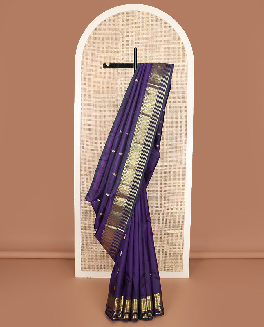 Blue zari buttas Kanchipuram silk saree, one-sided border of paneer sombu, banaras, muthu, and jaal design, and zari design pallu