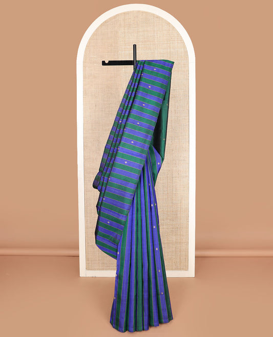 Borderless blue and green striped and buttas Kanchipuram silk saree, self-pallu features zari buttas